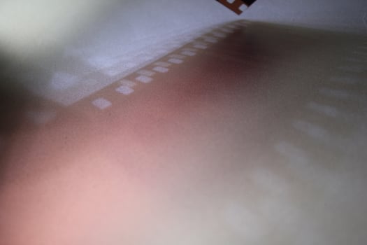 Shading light from photographic film intensity on a silver background photo