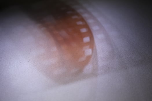 Shading light from photographic film intensity on a silver background photo