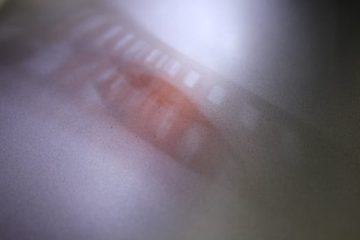 Shading light from photographic film intensity on a silver background photo