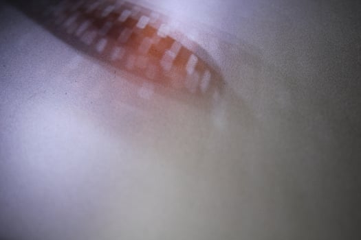 Shading light from photographic film intensity on a silver background photo