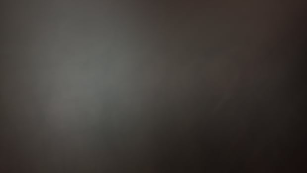 Abstract blur background with brown gray, black, white and earth tones. photo