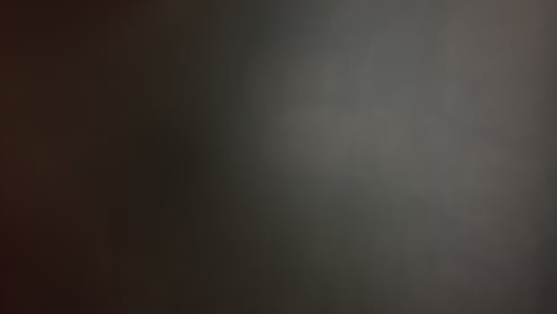 Abstract blur background with brown gray, black, white and earth tones. photo