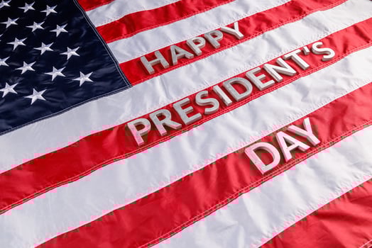 words happy presitdents day laid with real letters on US flag surface photo