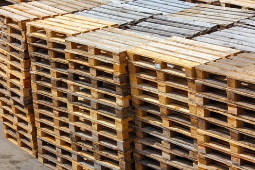 used wooden pallet stacks - perspective view from above photo