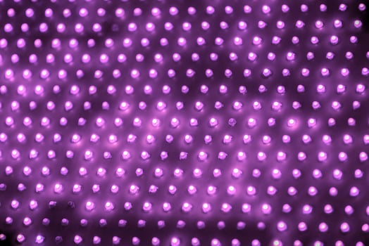 cheap outdoor purple screen led panel with individual diodes, full frame close-up view with selective focus photo