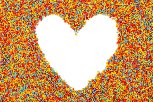 Rainbow colored sugar sprinkle dots, decorative heart shape frame mockup photo