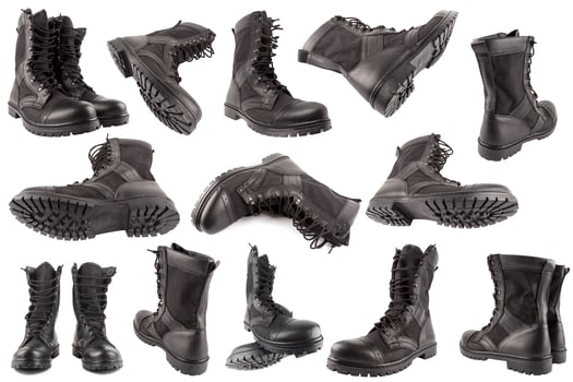 set of new black lightweight military boots isolated on white background photo