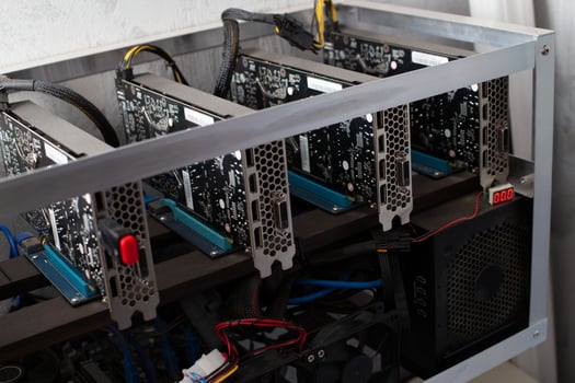 domestic gpu crypto mining rig under dust photo