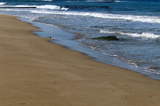 Sandy beach on the Mediterranean Sea in northern Israel. photo