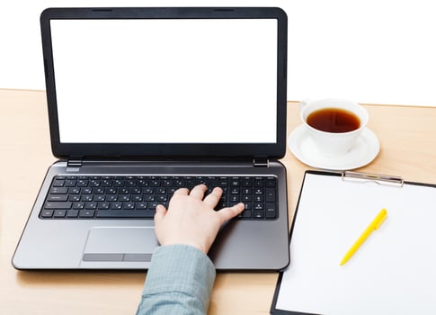 laptop with isolated screen on office table photo