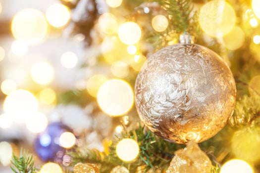 Classic Christmas decorated New year tree. Christmas tree with wite and silver decorations, ornaments toy and ball. Modern classical style interior design apartment. Christmas eve at home. photo