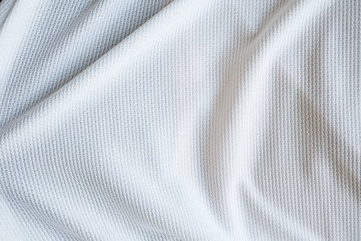 White football jersey clothing fabric texture sports wear background photo