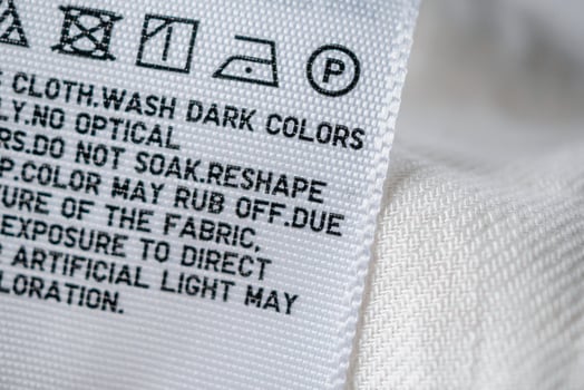 Cloth label tag with laundry care instructions photo