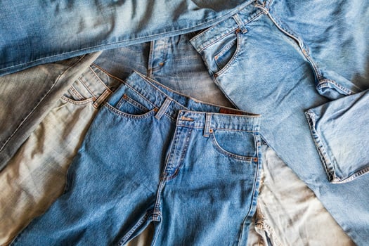 many denim blue jeans background photo