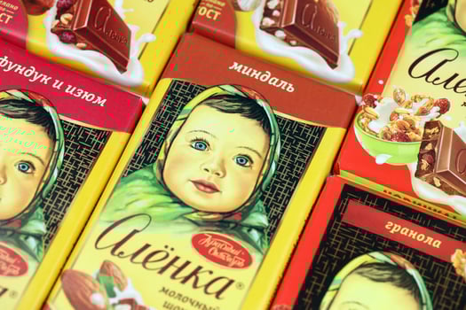 KHARKIV, UKRAINE - JANUARY 27, 2021 Alyonka chocolate square bars - product from Red October chocolate factory. Old russian traditional chocolate photo