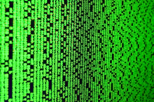 Macro of password selection on the monitor of the office computer. The concept of hacking the protection of a personal data keeper. The stream of supposed digital passwords of four and five digits photo