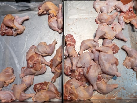 chicken meat from refrigerated section at supermarket. photo