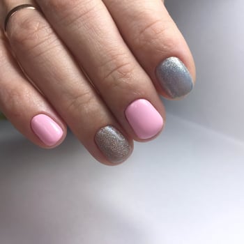 Manicure of different colors on nails. Female manicure on the hand photo
