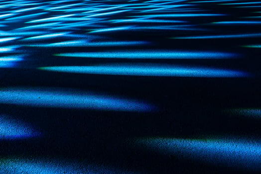 Dramatic multicolored lights on the floor in a disco, stage light show. photo
