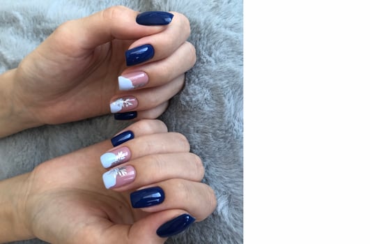 Bright multi-colored design of manicure.Multicolored manicure close up photo