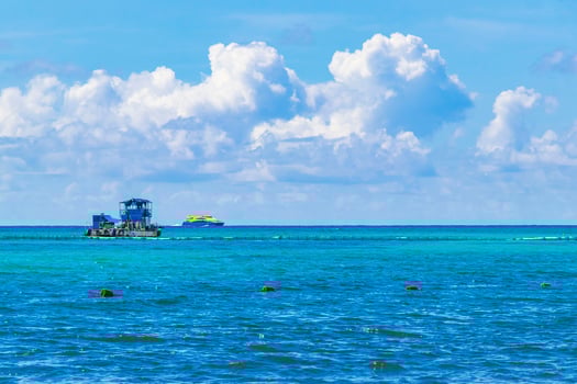 Boats yachts ship jetty beach in Playa del Carmen Mexico. photo