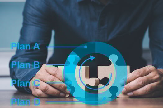 Businessman hand connecting jigsaw puzzle with plan A B C D, Business solutions, concept of strategy and planing, photo