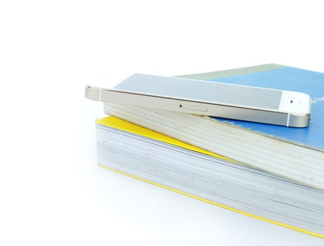 Smart phone and books photo