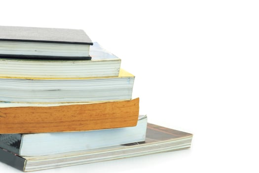 books stack isolated on white background photo