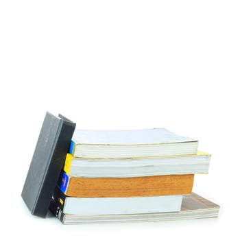 books stack isolated on white background photo