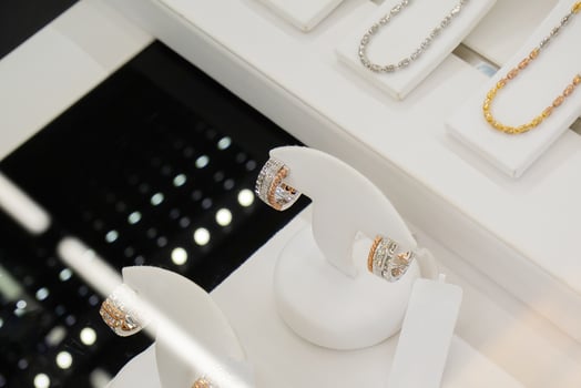 jewelry diamond earrings show in luxury retail store window display showcase photo