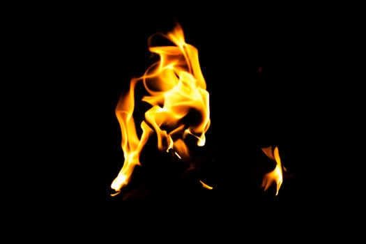Fire flame texture. Burning material backdrop. Burn effect pattern. Blaze and torch wallpaper. Heat and haze backdrop. photo