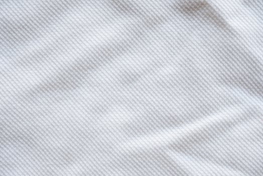 White fabric sport clothing jersey texture background photo