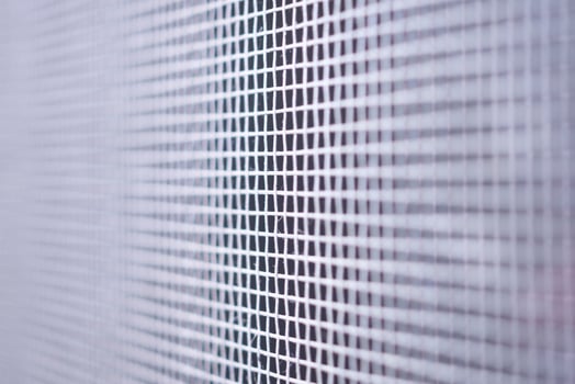 mosquito net wire screen close up on house window protection against insect photo
