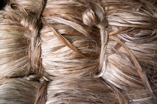 A thick bundle of Golden jute fiber Texture Background photo