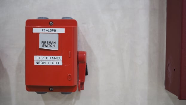 Fireman switch or Fire alarm  or bell warning equipment.In the building for safety. photo