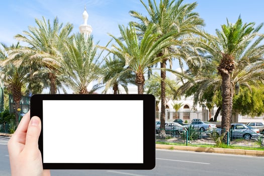 tourist photographs King Hussein Street in Aqaba photo