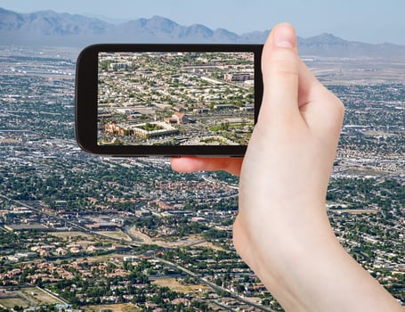 tourist taking photo of Las Vegas Downtown