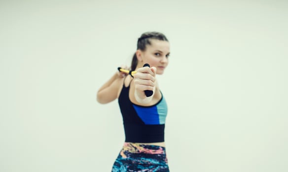 Fitness woman from back doing exercises photo