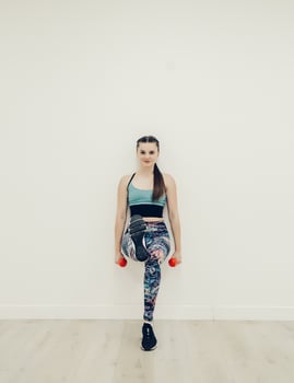fitness girl doing strength exercises photo