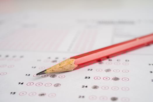 Answer sheets with pencil drawing fill to select choice, education concept. photo