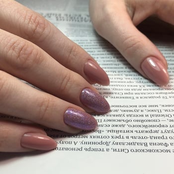 Bright multi-colored design of manicure.Multicolored manicure close up photo