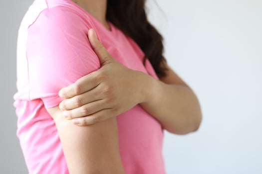 Woman have neck pain, shoulder pain in the  room. photo