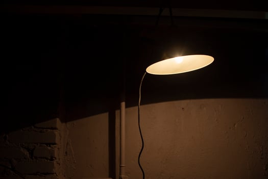 Lamp in room. Dim light indoors. Utility room. photo