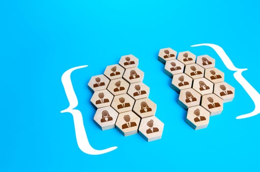 Two groups in parentheses strive for unity. Generalization and reunification into a larger organization. Merger of companies, joining forces. Reconciliation and consensus. Association, alliance. photo