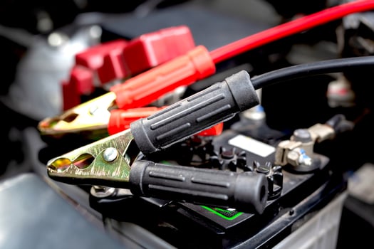Employees are checking the car battery. photo