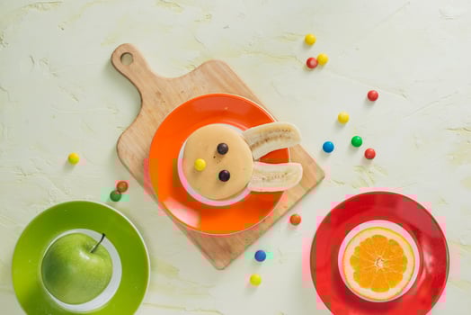 Funny bunny pancakes with fruits for Easter kids breakfast photo