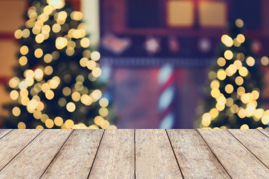 Christmas holiday background with empty wooden table photo