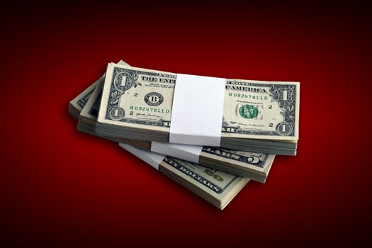 Bundle of US dollar bills isolated on white. Pack of american money with high resolution on perfect white background photo