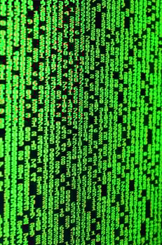 Macro of password selection on the monitor of the office computer. The concept of hacking the protection of a personal data keeper. The stream of supposed digital passwords of four and five digits photo