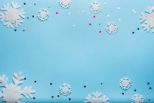 Christmas or winter composition. Pattern made of snowflakes on pastel blue background. photo